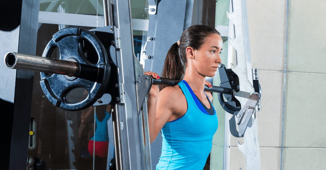 Solo workout with a Smith machine that has adjustable bar catches.