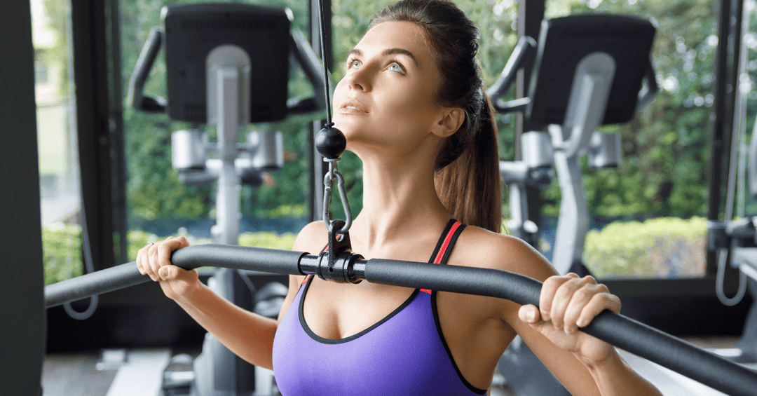 Image illustrating a person performing a lat pulldown.